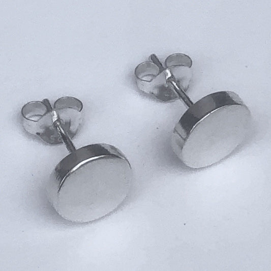Raised circle silver studs