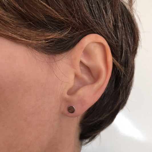 Raised circle silver studs