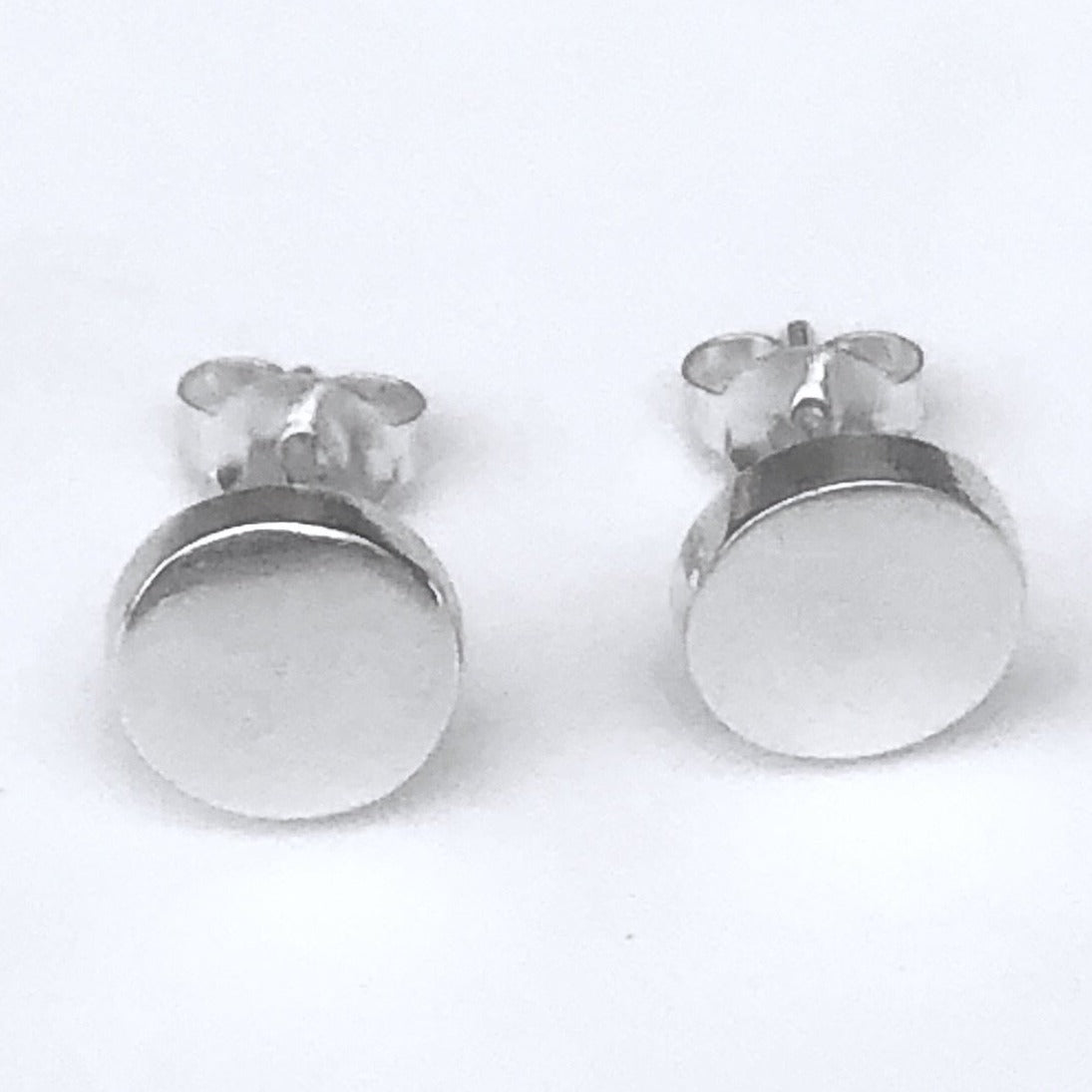 Raised circle silver studs